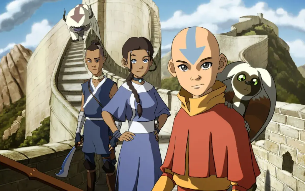 Aang, Sokka i Katara na murze, z Appą i Momo. Avatar: Legenda Aanga film 2026.
