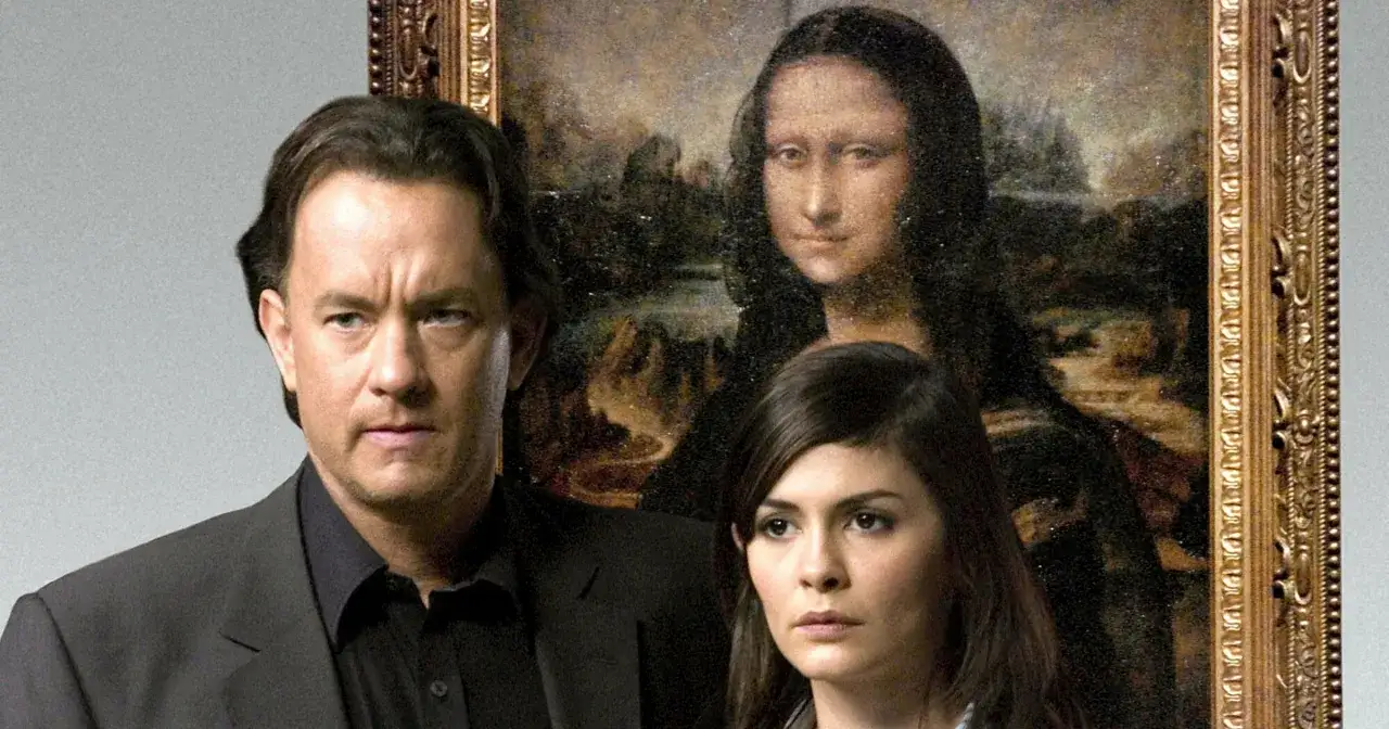 Tom Hanks i Audrey Tautou, główni aktorzy z filmu Kod da Vinci, pozują przed obrazem Mona Lisa.